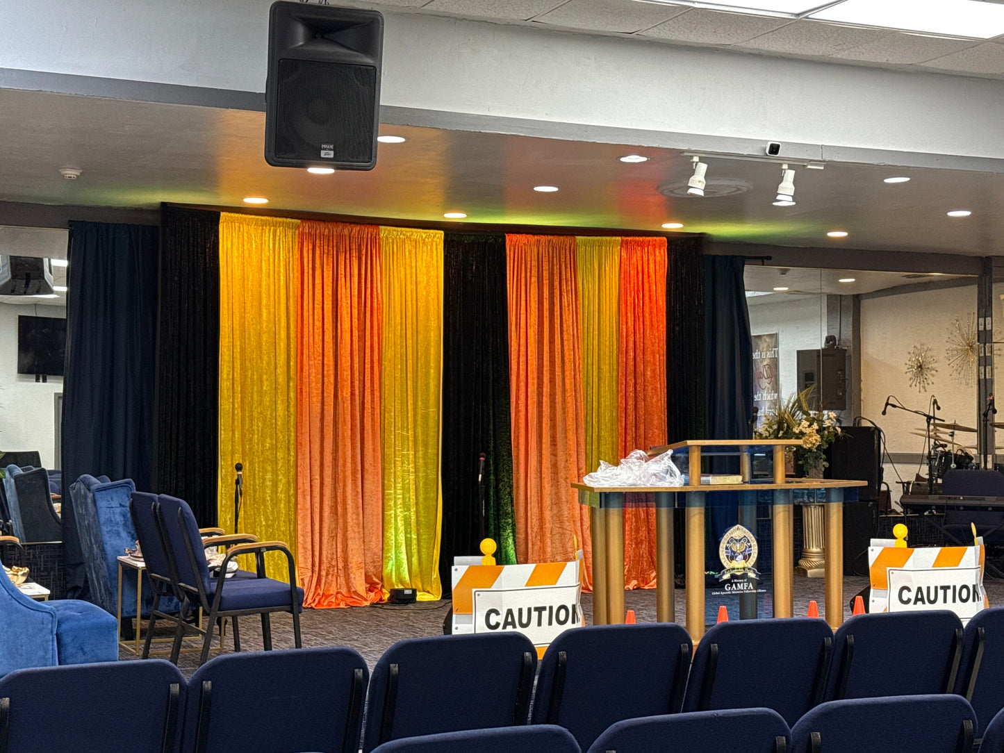 Yellow, Orange & Black Pipe and Drape