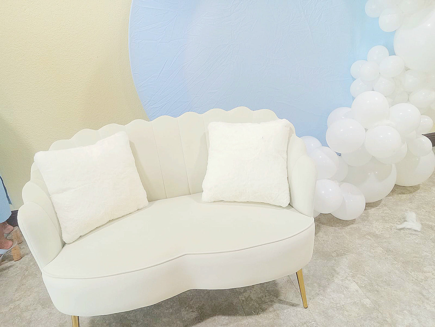 White Loveseat with Pillows