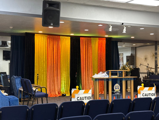 Yellow, Orange & Black Pipe and Drape